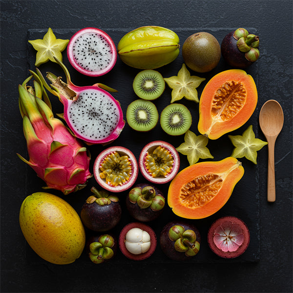 A vibrant assortment of exotic fruits including dragon fruit, kiwi, and passionfruit from the Exotic Fruits collection.