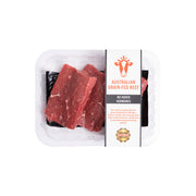 Packaged Australian grain-fed beef with a white background