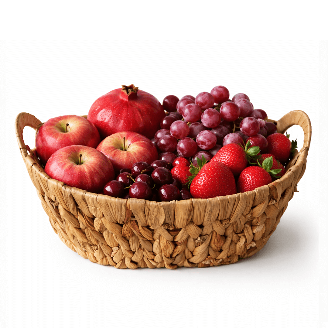 Heart’s Delight Basket filled with fresh apples, grapes, strawberries, and pomegranates.